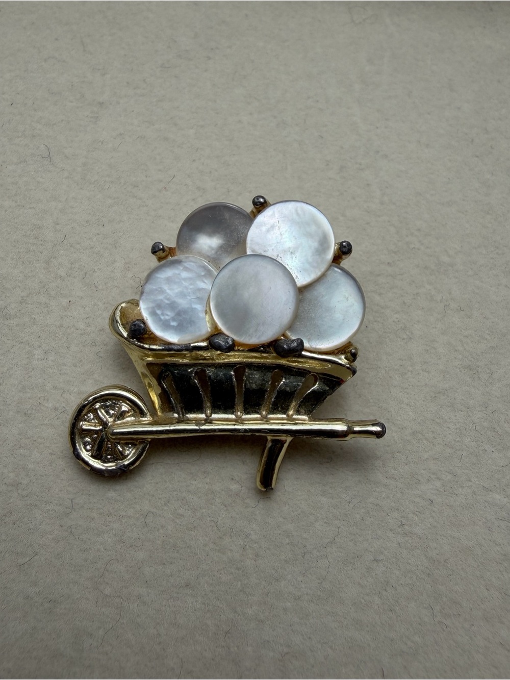 Vintage Gold-Tone Wheelbarrow Brooch with Mother-of-Pearl Discs
